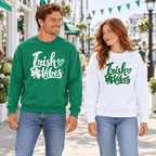 Man in a Kelly Green Irish Vibes sweatshirt beside a woman in the white version, showing both color options.