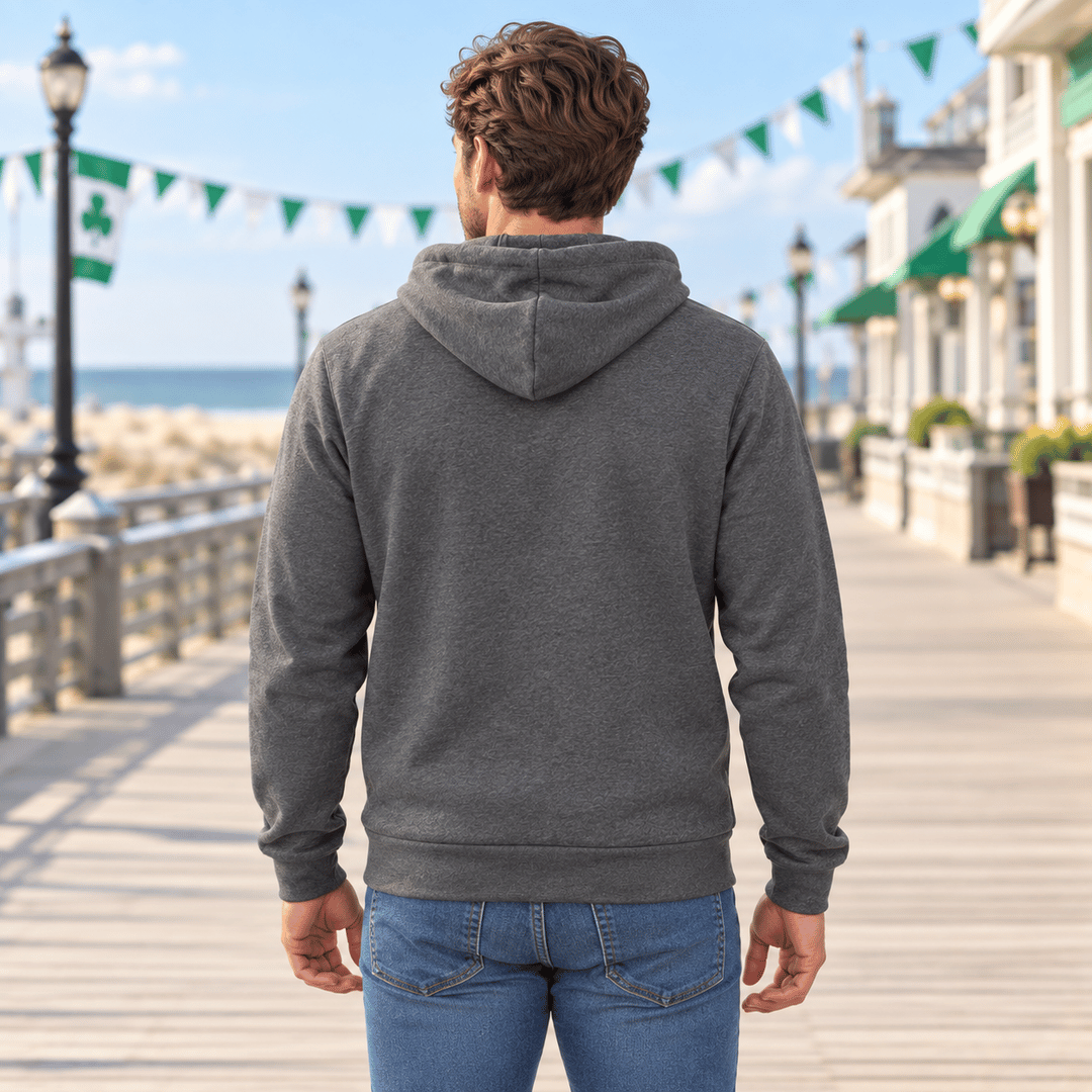 Back view of a man wearing a plain Deep Heather pullover hoodie outdoors
