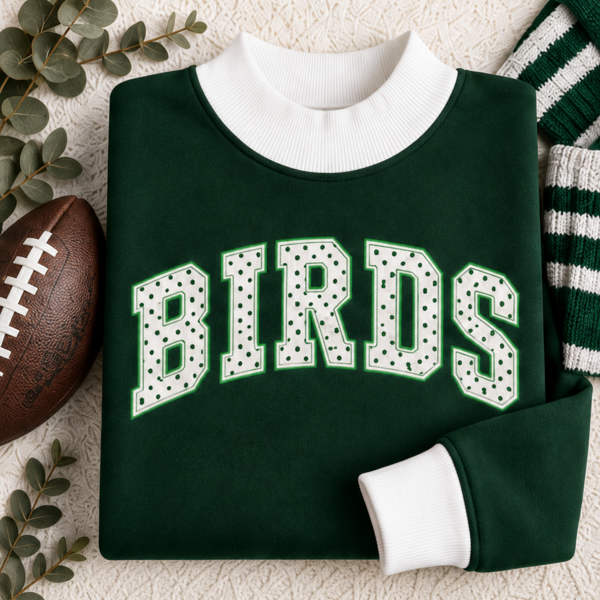 Folded dark green and white BIRDS polka dot mock neck sweatshirt for women