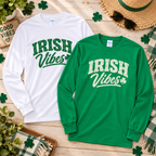White and Kelly Green Irish Vibes long sleeve shirts flat lay