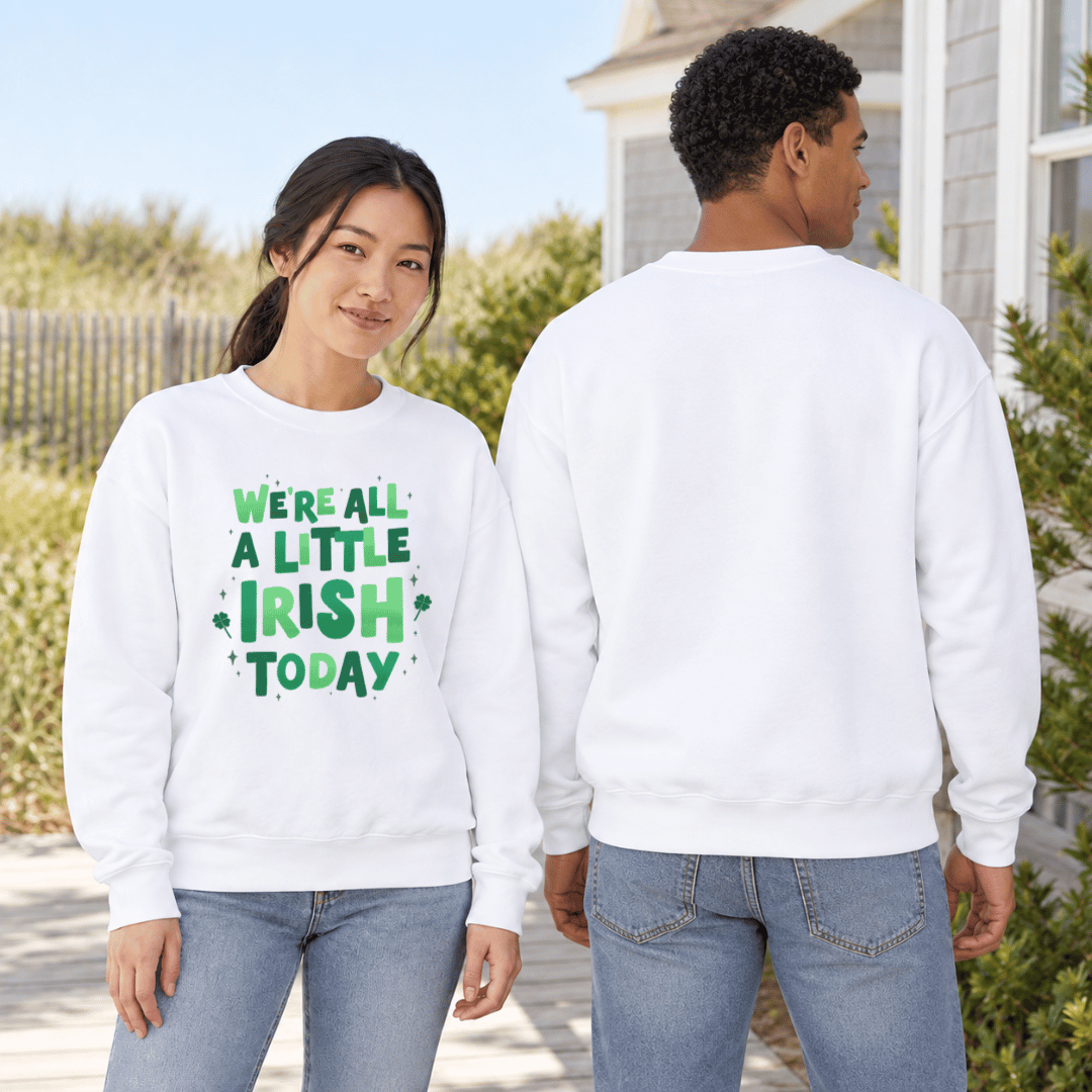Woman showing the green Irish Today graphic while a man shows the plain back of the white sweatshirt