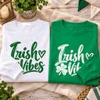 Folded white and Kelly Green Irish Vibes sweatshirts showing their coordinating green and white designs.