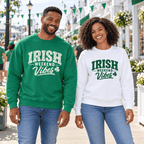 Man and woman standing outdoors in Kelly Green and white Irish Weekend Vibes crewneck sweatshirts