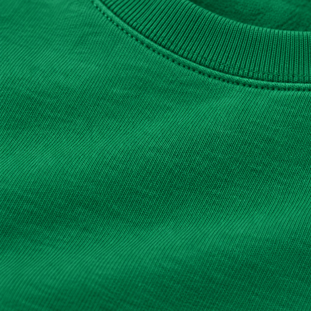 Close-up of the Kelly Green sweatshirt fabric and ribbed crew neckline.
