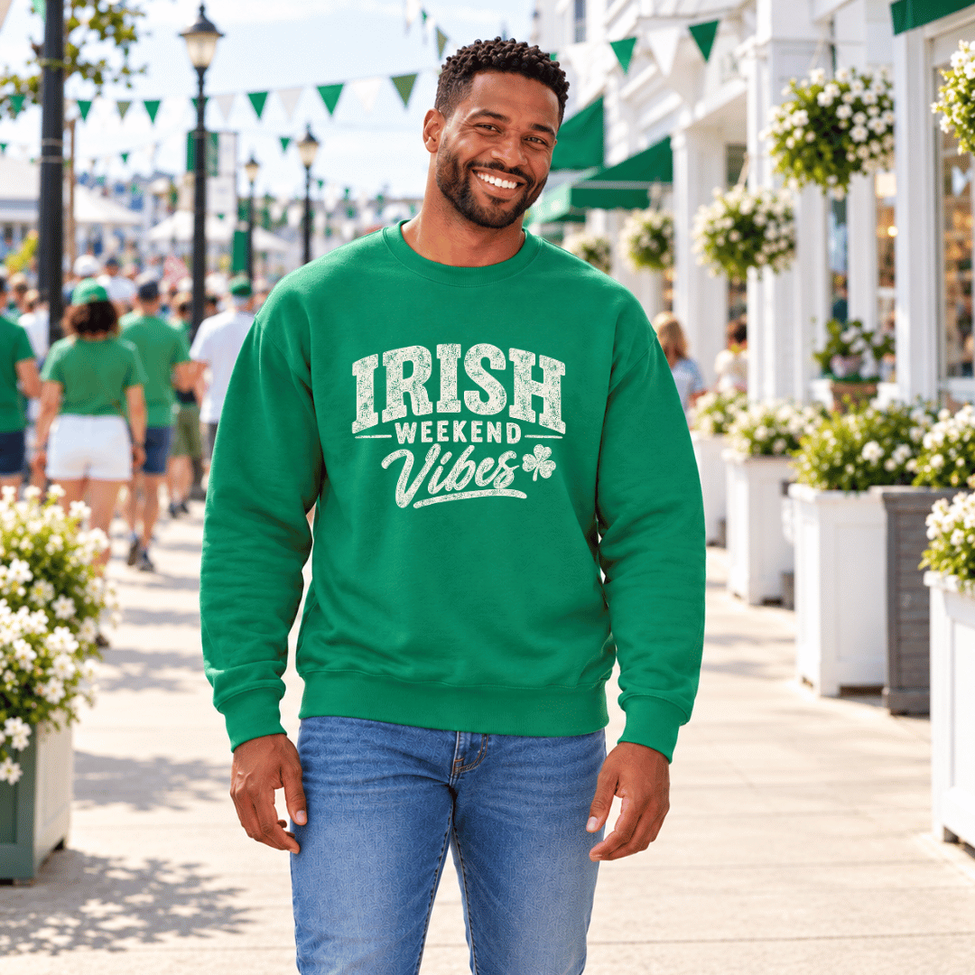 Man wearing a Kelly Green crewneck sweatshirt with a white Irish Weekend Vibes graphic