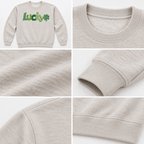Collage showing the Lucky graphic sweatshirt, neckline, fabric, cuff and waistband