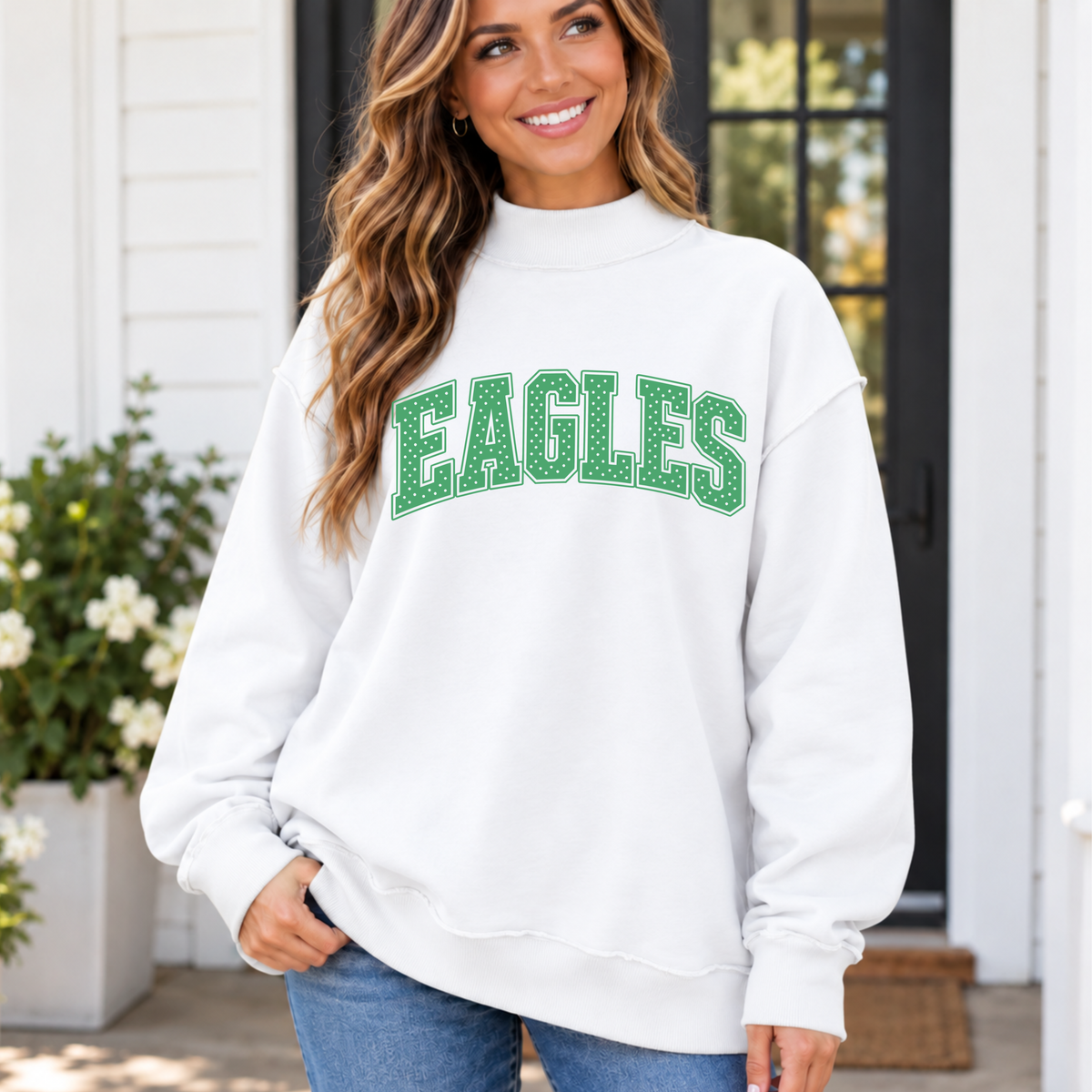 Women’s white Philly mock neck sweatshirt with green EAGLES polka dot lettering for game day