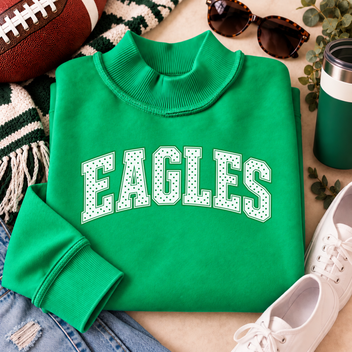 Women’s Kelly green Philly mock neck sweatshirt with white EAGLES polka dot design styled with football game day accessories