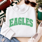 Women’s white Philly mock neck sweatshirt with green EAGLES polka dot design styled with football game day accessories