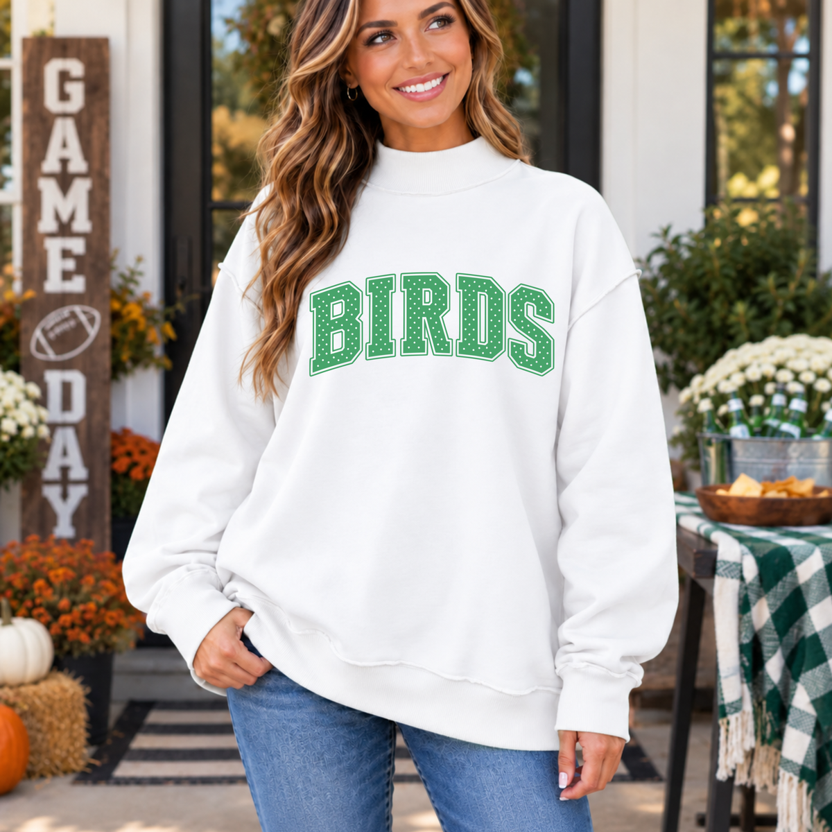 Women’s white Philly mock neck sweatshirt with green BIRDS polka dot lettering for football game day