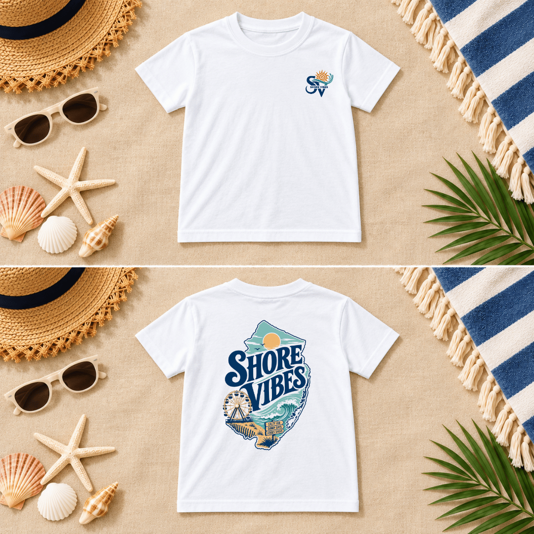 White Shore Vibes t-shirt flat lay showing the front logo and full back graphic on a beach themed background